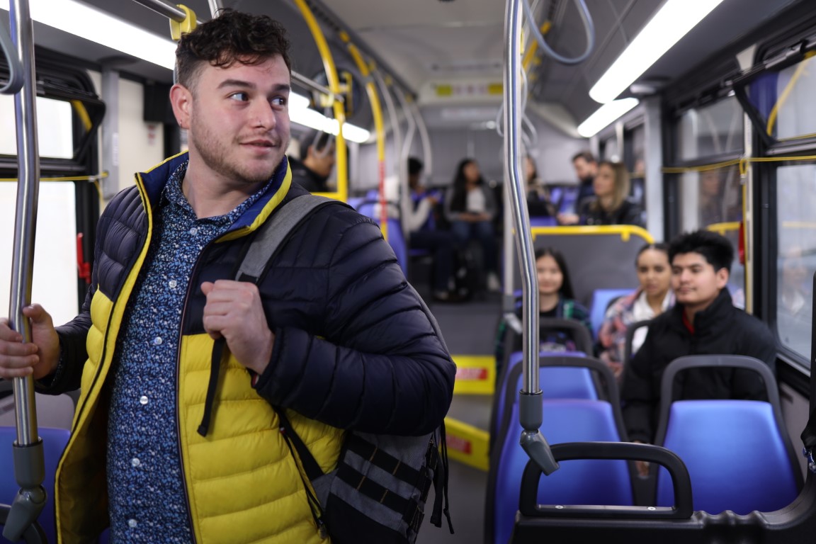 Person riding a SamTrans bus